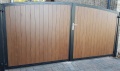 Arched Metal Driveway Gate With Aluminium Infill